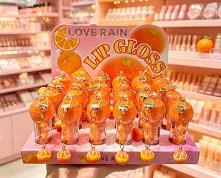 LIP GLOSS COM CHAVEIRO LOVE RAIN CORES SEPARAR QUE ESTEVEM DISPONIVEIS