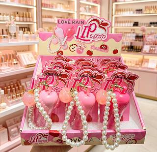 LIP GLOSS COM CHAVEIRO LOVE RAIN CORES SEPARAR QUE ESTEVEM DISPONIVEIS