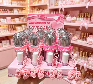 LIP GLOSS COM CHAVEIRO LOVE RAIN CORES SEPARAR QUE ESTEVEM DISPONIVEIS
