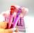 Lip Gloss Glitter com Pom Pom Bobbi Rara ( Cor Sortido )
