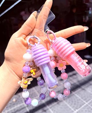 Lip Gloss Com chaveiro Dhermosa Corrs separar que estevem disponíveis