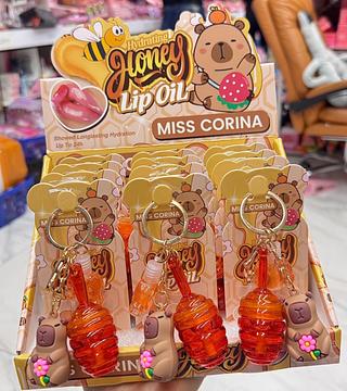 Lip gloss + Lip Oil Com Chaveiro Miss Corina