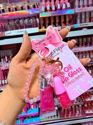 LIP GLOSS COM CHAVEIRO COCOFLEUR CORES SEPARAR QUE ESTEVEM DISPONIVEIS