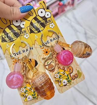 Lip Gloss Mel com chaveiro love Rain cores separar que estevem disponíveis